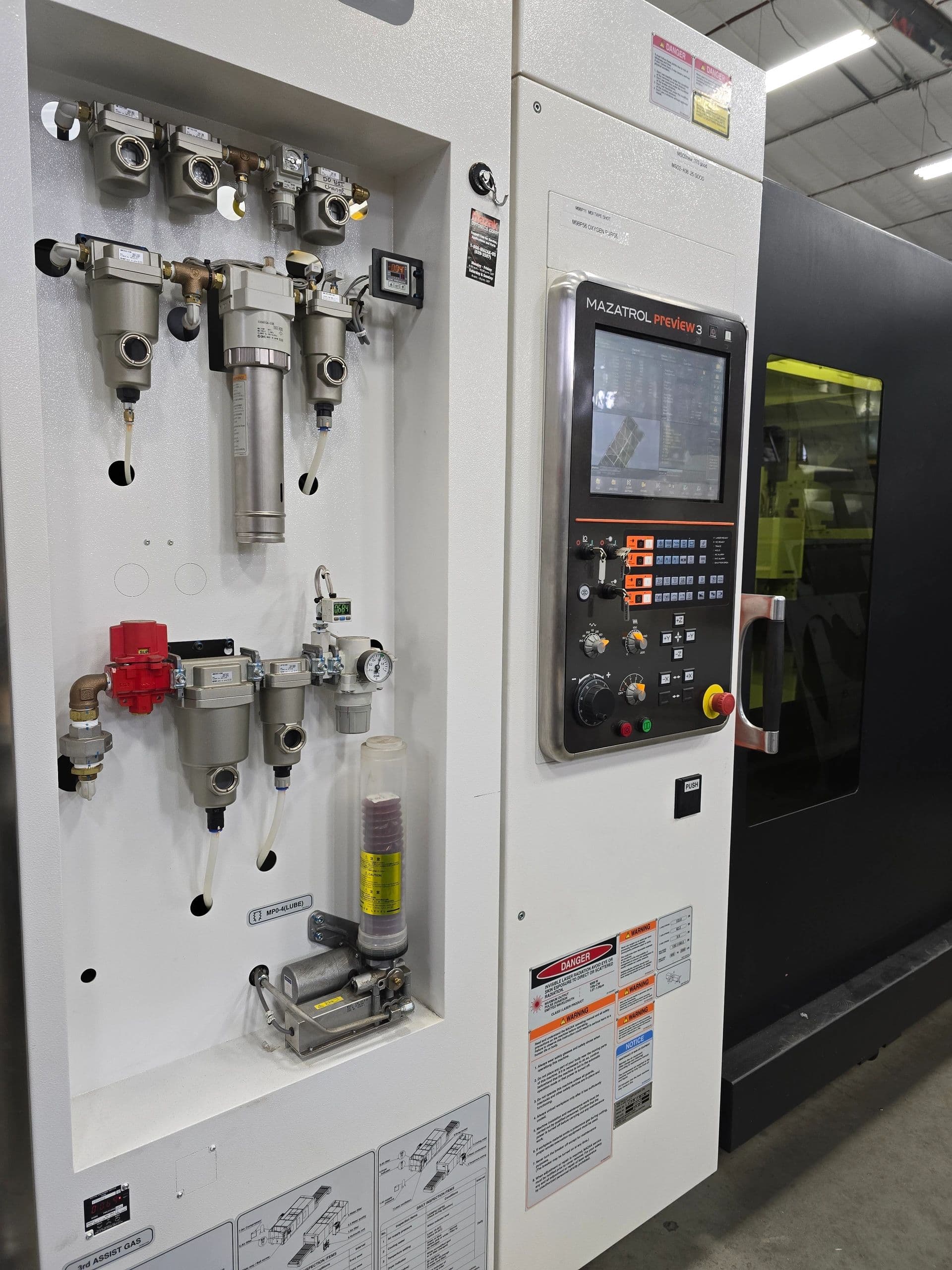 Mazatrol control panel and pneumatics on the laser cell