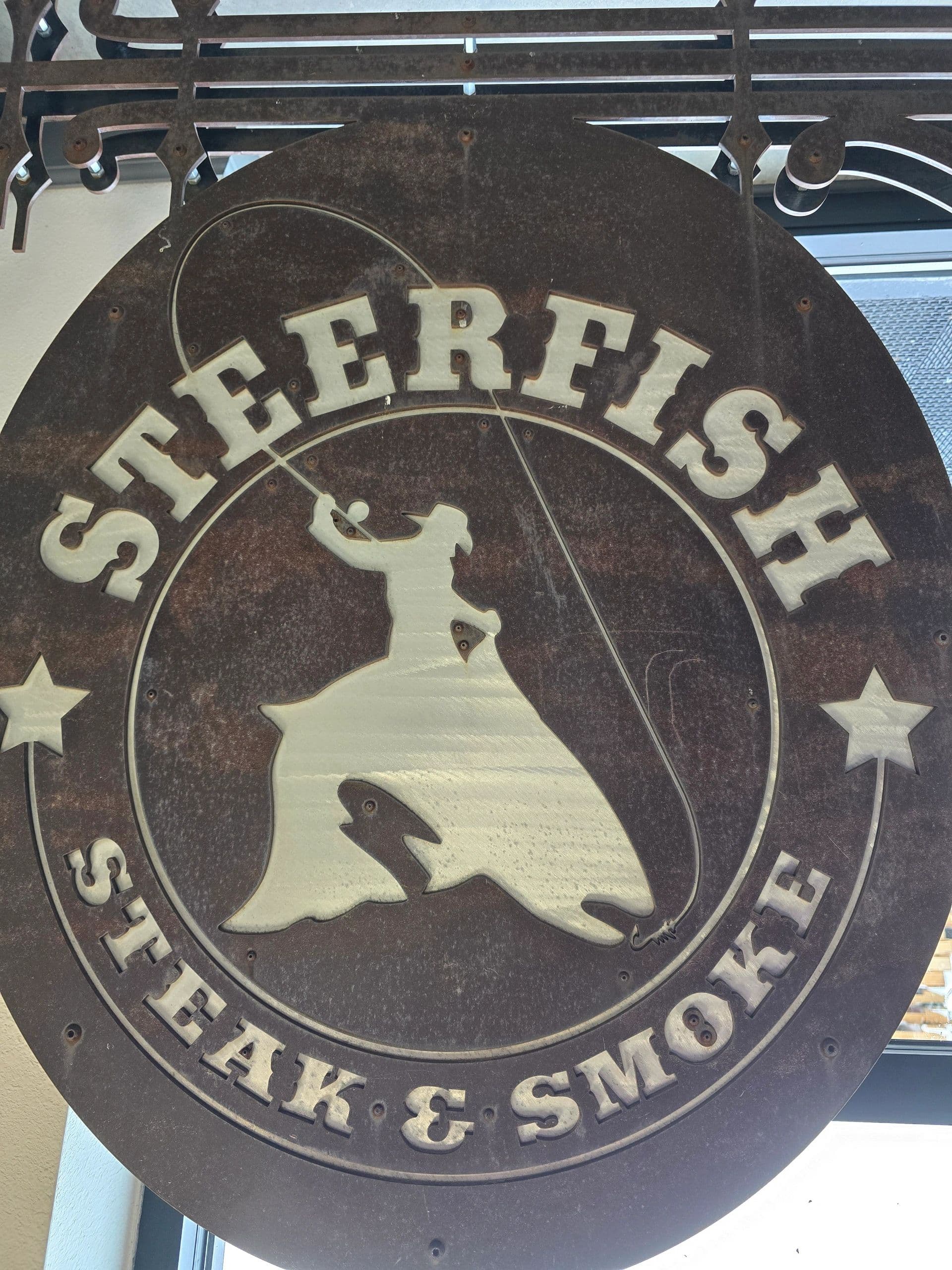 Custom metal sign — Steerfish Steak & Smoke